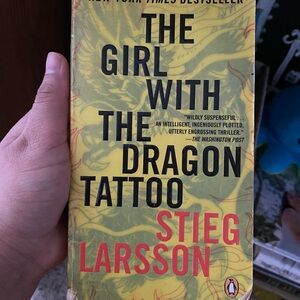 The Girl with the Dragon Tattoo by Stieg Larsson - Yellow Cover